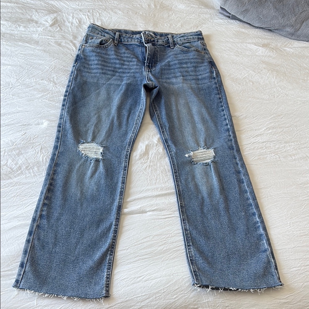 Distressed Blue Jeans
